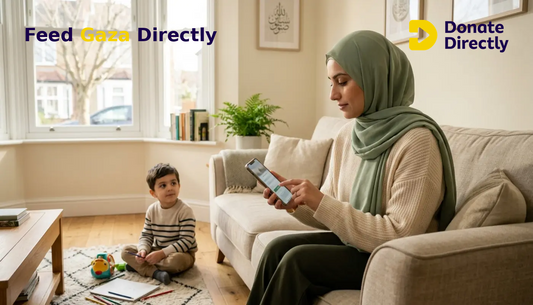 British Muslim mother donating to Gaza relief from a bright UK home.