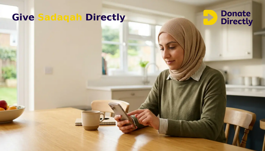 British Muslim woman setting up regular Sadaqah in a bright UK home kitchen.