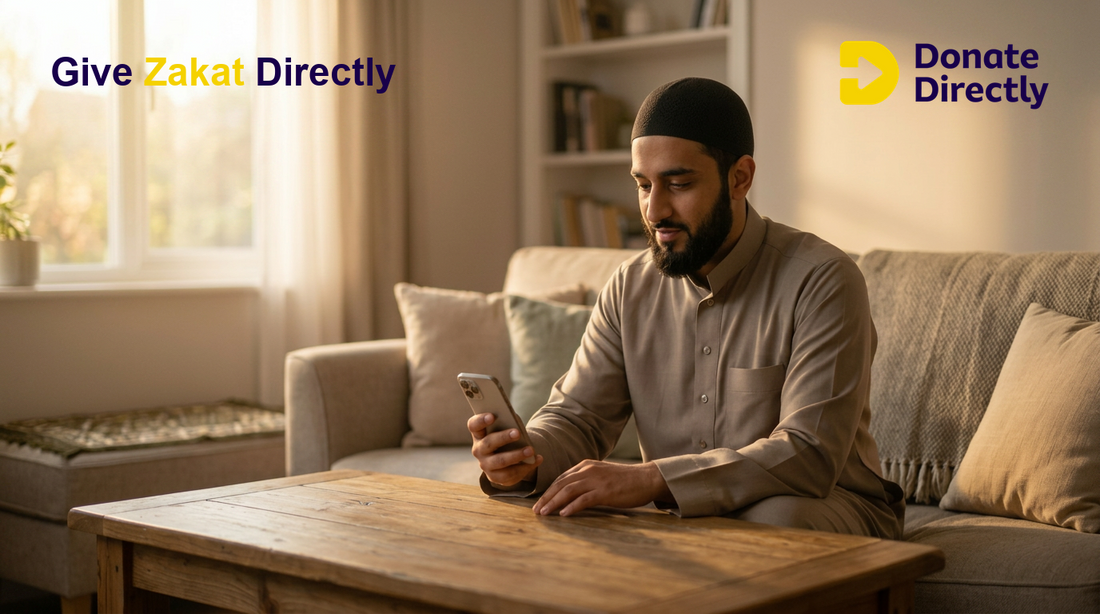 UK donor giving Sadaqah on a phone in a warm home setting
