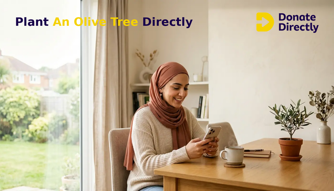 UK Muslim woman donating on phone at home to plant an olive tree as ongoing charity