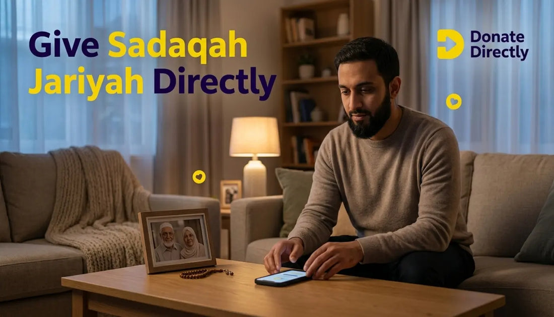 Muslim donor in UK home giving Sadaqah Jariyah in memory of parents using phone in a warm reflective setting.
