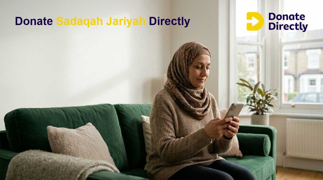 UK Muslim donor giving Sadaqah Jariyah on a phone in a warm home setting