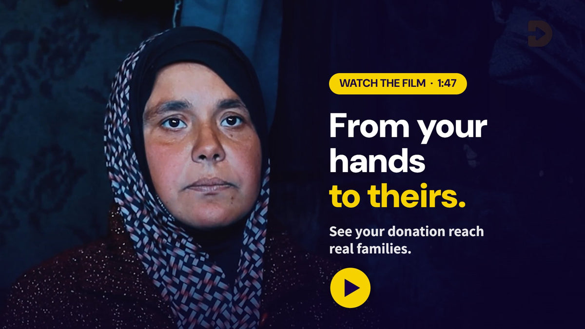 Woman in Gaza looking at the camera - watch the Donate Directly film